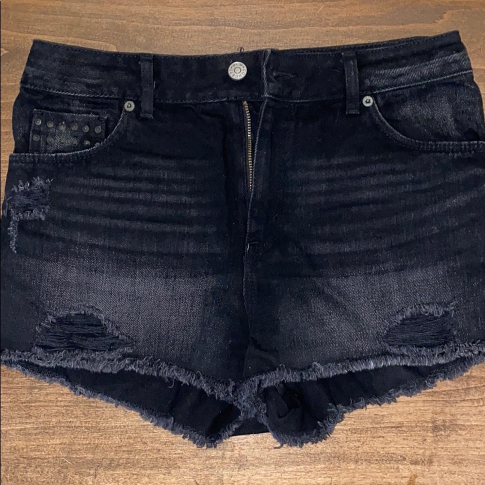 Distressed black denim